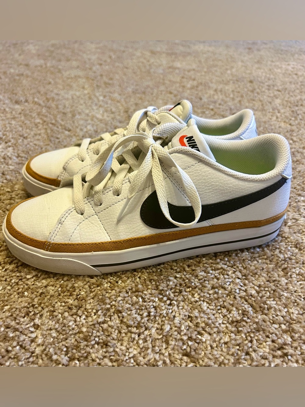 Nike White Sneakers with Black Swoosh and Tan Trim